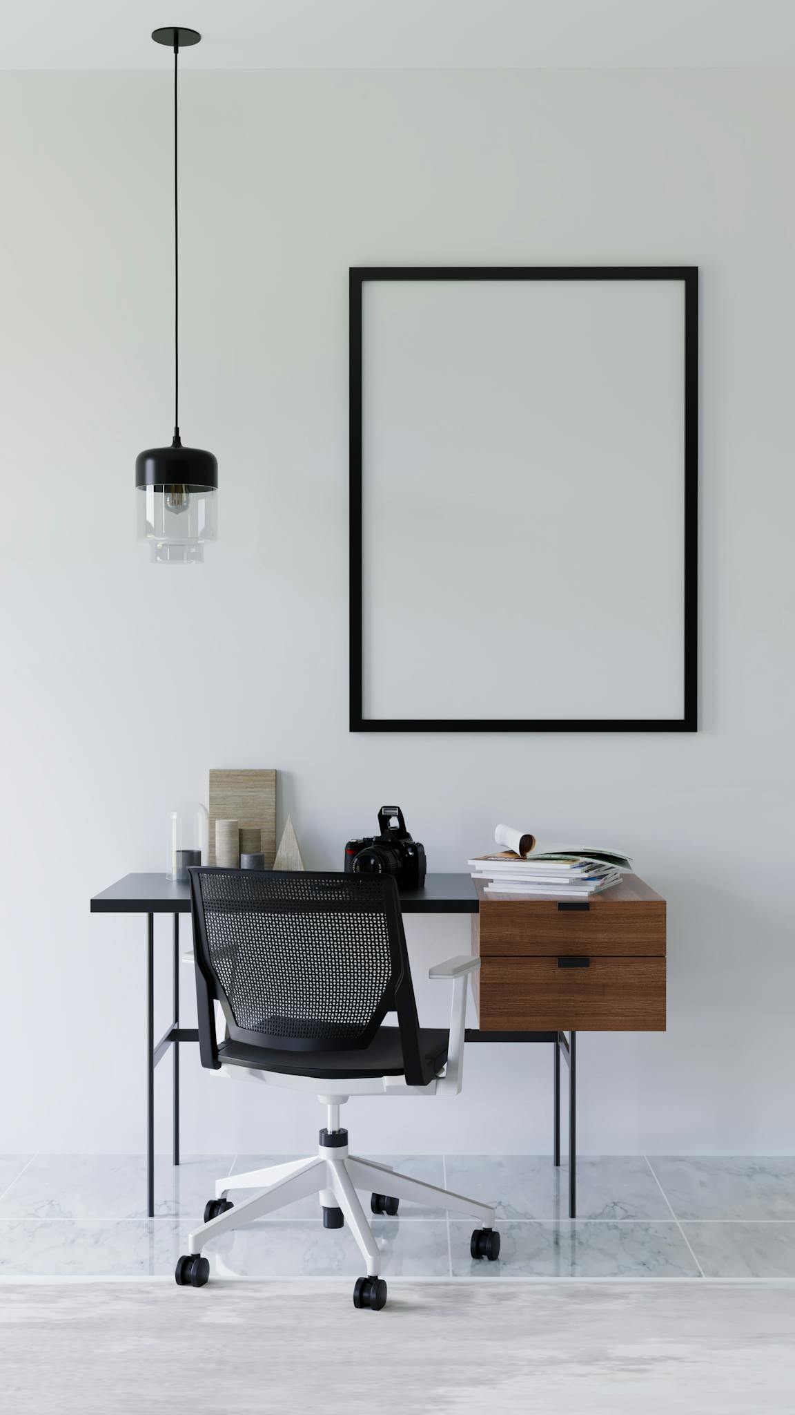 A sleek and modern office desk setup featuring a blank frame for customization.